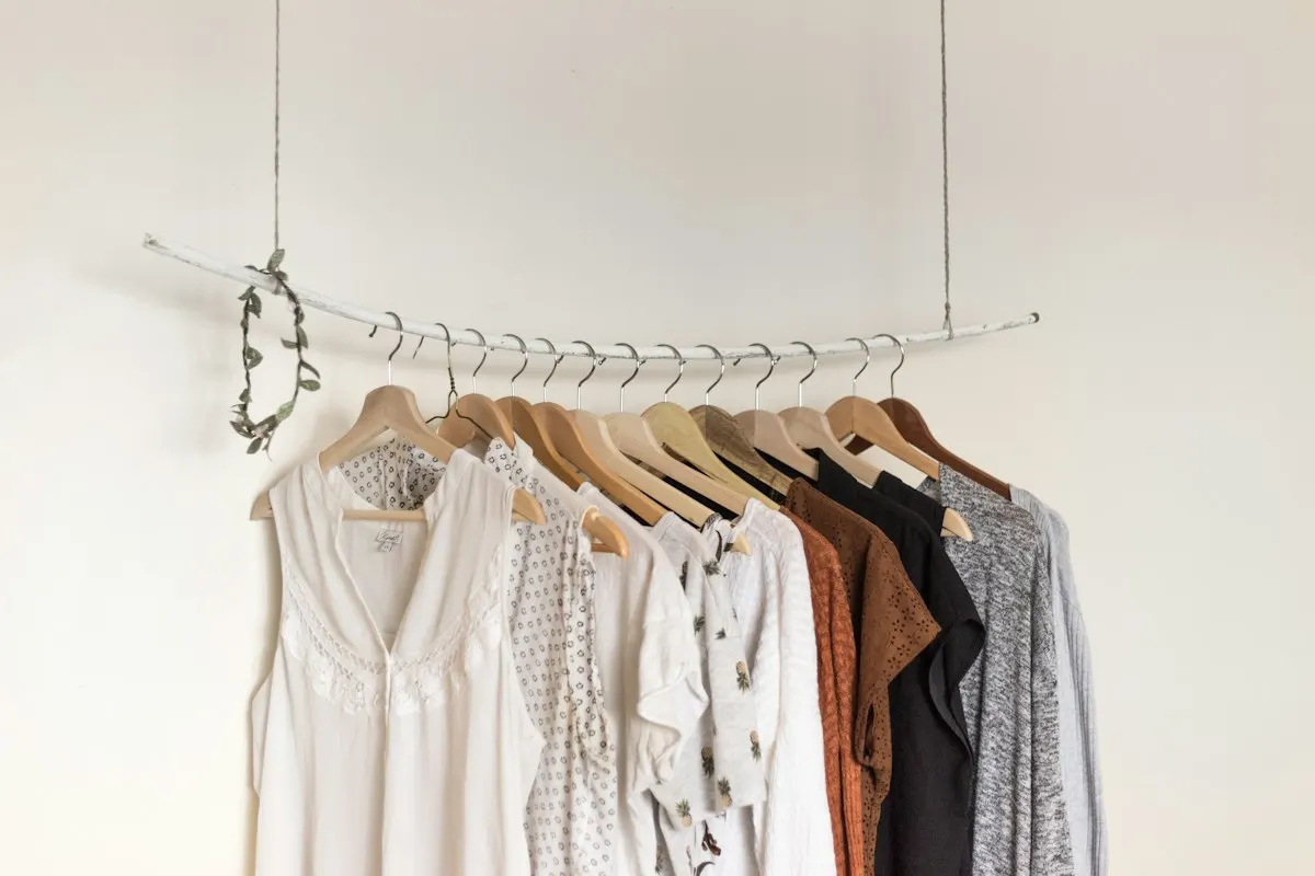 Clothing arranged on matching timber hangers